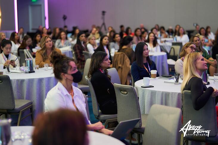 Image of a room with the Attendees of the Extraordinary Women In Tech Global Conference.